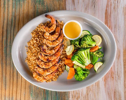 Grilled Gulf Shrimp with seasoned rice and steamed vegetables